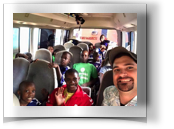 In the Agape bus with visitor.jpg